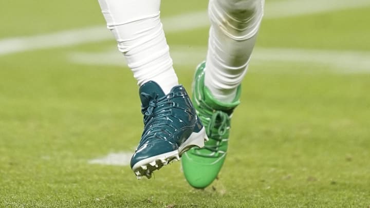 Philadelphia Eagles quarterback Jalen Hurts received a fine for wearing mismatched Air Jordan cleats.