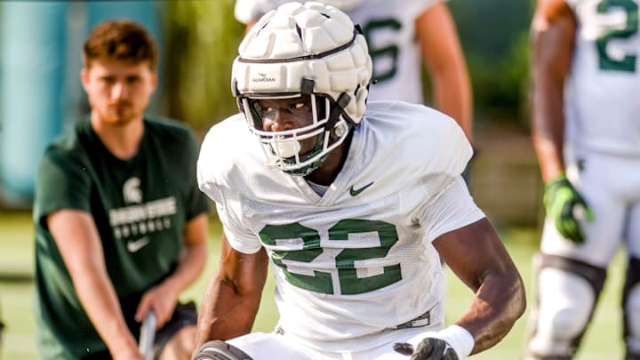 Michigan State defensive lineman Bai Jobe runs a drill during football practice on Wednesday, Aug.