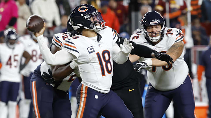 Oct 27, 2024; Landover, Maryland, USA; Chicago Bears quarterback Caleb Williams (18) passes the ball against the Washington Commanders during the third quarter at Northwest Stadium. Mandatory Credit: Geoff Burke-Imagn Images