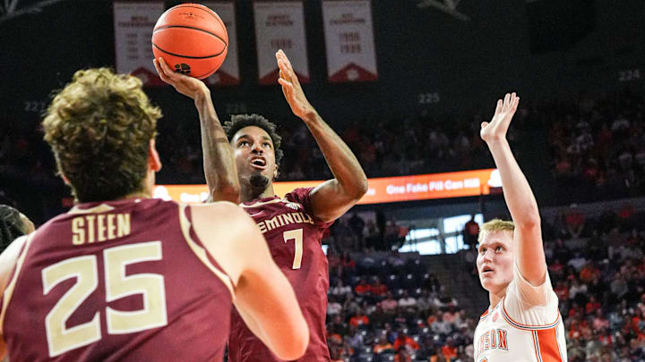 Florida State University forward Chauncey Wiggins (7) takes a shot near Clemson forward Chase Thompson (3) during the first half at Littlejohn Coliseum in Clemson, S.C Saturday, February 21, 2026.