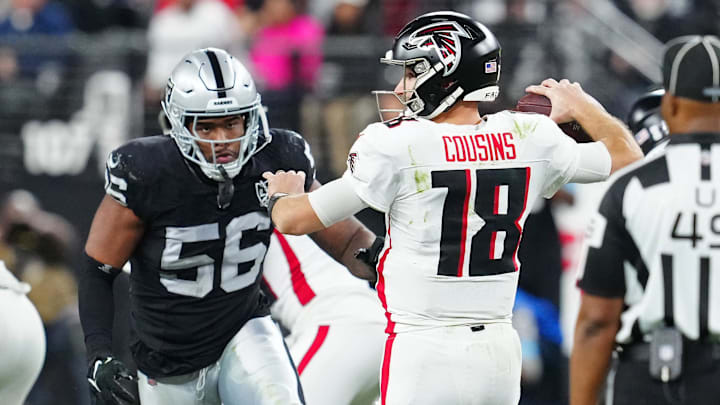 Dec 16, 2024; Paradise, Nevada, USA; Las Vegas Raiders linebacker Amari Burney (56) looks to sack Atlanta Falcons quarterback Kirk Cousins (18) during the third quarter at Allegiant Stadium. Mandatory Credit: Stephen R. Sylvanie-Imagn Images Dec 16, 2024; Paradise, Nevada, USA; Las Vegas Raiders linebacker Amari Burney (56) looks to sack Atlanta Falcons quarterback Kirk Cousins (18) during the third quarter at Allegiant Stadium. Mandatory Credit: Stephen R. Sylvanie-Imagn Images