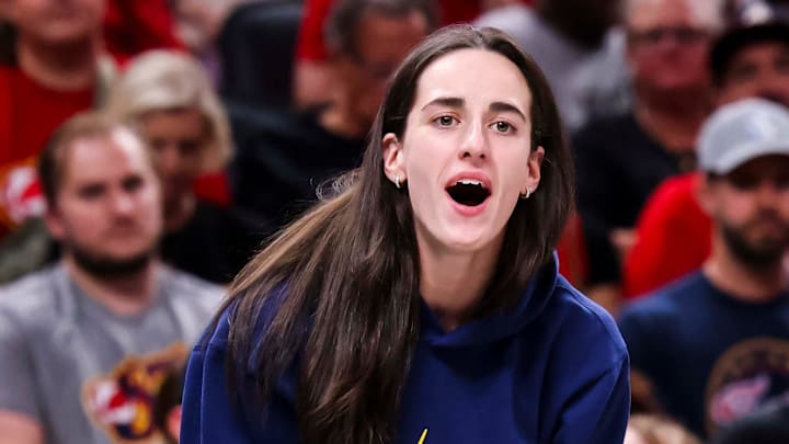 Indiana Fever guard Caitlin Clark (22) cheers on the team Thursday, June 26, 2025, during a game between the Indiana Fever and the Los Angeles Sparks at Gainbridge Fieldhouse in Indianapolis.