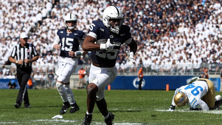Penn State Nittany Lions running back Quinton Martin Jr. runs with the ball during the third quarter against the UCLA Bruins at Beaver Stadium.