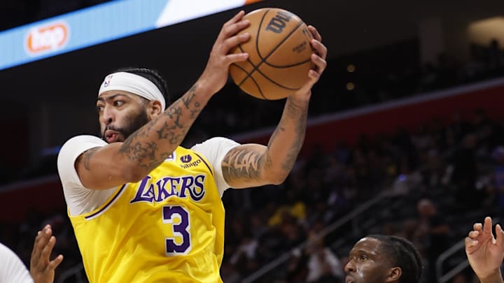 Nov 29, 2023; Detroit, Michigan, USA; Los Angeles Lakers forward Anthony Davis (3) grabs a rebound in the second half against the Detroit Pistons at Little Caesars Arena. Mandatory Credit: Rick Osentoski-Imagn Images