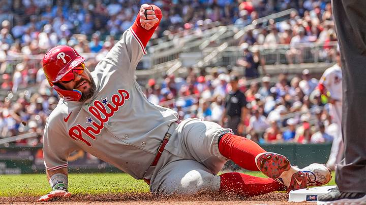 Sep 13, 2026; Cumberland, Georgia, USA; Philadelphia Phillies designated hitter Kyle Schwarber (12) slides into third base against the Atlanta Braves at Truist Park. Mandatory Credit: Dale Zanine-Imagn Images Sep 13, 2026; Cumberland, Georgia, USA; Philadelphia Phillies designated hitter Kyle Schwarber (12) slides into third base against the Atlanta Braves at Truist Park. Mandatory Credit: Dale Zanine-Imagn Images