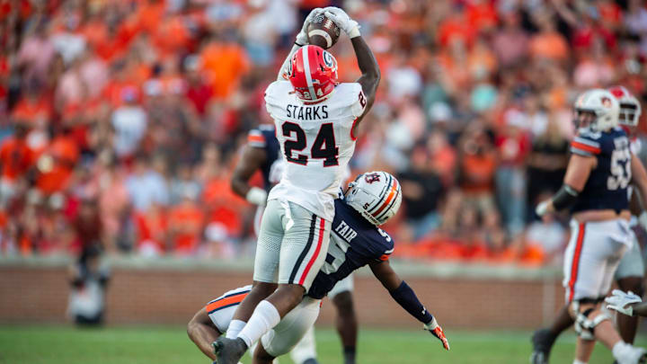 Georgia Bulldogs defensive back Malaki Starks (24) makes the game sealing interception as Auburn Tigers take on Georgia Bulldogs at Jordan-Hare Stadium in Auburn, Ala., on Saturday, Sept. 30, 2023. Georgia Bulldogs defeated Auburn Tigers 27-20.