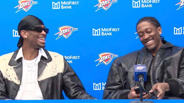 Shai Gilgeous-Alexander and Jalen Williams share a laugh about Williams’s height during a press conference.