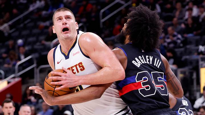 Nov 20, 2023; Detroit, Michigan, USA; Denver Nuggets center Nikola Jokic (15) is defended by Detroit Pistons forward Marvin Bagley III (35) in the first half at Little Caesars Arena. Mandatory Credit: Rick Osentoski-USA TODAY Sports Nov 20, 2023; Detroit, Michigan, USA; Denver Nuggets center Nikola Jokic (15) is defended by Detroit Pistons forward Marvin Bagley III (35) in the first half at Little Caesars Arena. Mandatory Credit: Rick Osentoski-USA TODAY Sports