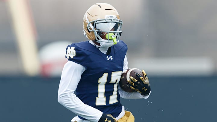 Notre Dame wide receiver Elijah Burress runs with the ball during a football practice at Irish Athletic Center on Thursday, July 31, 2025, in South Bend.