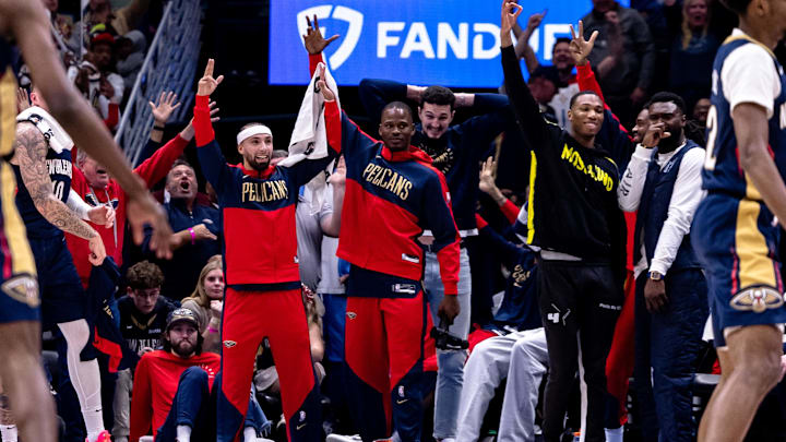 Jan 3, 2025; New Orleans, Louisiana, USA; New Orleans Pelicans bench reacts to guard CJ McCollum (not pictured) scoring 50 points against the Washington Wizards during the second half at Smoothie King Center. Mandatory Credit: Stephen Lew-Imagn Images