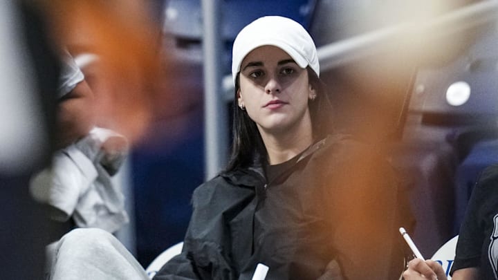 Sep 28, 2024; Indianapolis, Indiana, USA; Indiana Fever guard Caitlin Clark (22) watches practice during practice by the Butler Bulldogs mens basketball team at Hinkle Fieldhouse. As part of Family Weekend at Butler, the men's basketball team opened its practice to fans. Mandatory Credit: Grace Smith/USA TODAY Network via Imagn Images Sep 28, 2024; Indianapolis, Indiana, USA; Indiana Fever guard Caitlin Clark (22) watches practice during practice by the Butler Bulldogs mens basketball team at Hinkle Fieldhouse. As part of Family Weekend at Butler, the men's basketball team opened its practice to fans. Mandatory Credit: Grace Smith/USA TODAY Network via Imagn Images