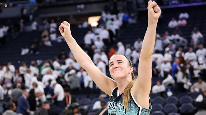 Oct 16, 2024; Minneapolis, Minnesota, USA; New York Liberty guard Sabrina Ionescu (20) celebrates her teams win after game three of the 2024 WNBA Finals against the Minnesota Lynx at Target Center. Mandatory Credit: Matt Krohn-Imagn Images