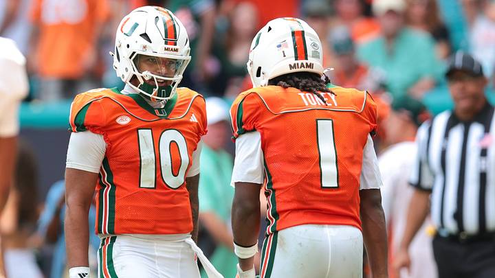 Oct 24, 2026; Miami Gardens, Florida, USA; Miami Hurricanes wide receiver Malachi Toney (1) celebrates with quarterback Darian Mensah (10) after scoring a touchdown against the Pittsburgh Panthers during the second quarter at Hard Rock Stadium. Mandatory Credit: Sam Navarro-Imagn Images Oct 24, 2026; Miami Gardens, Florida, USA; Miami Hurricanes wide receiver Malachi Toney (1) celebrates with quarterback Darian Mensah (10) after scoring a touchdown against the Pittsburgh Panthers during the second quarter at Hard Rock Stadium. Mandatory Credit: Sam Navarro-Imagn Images