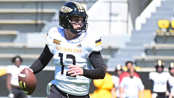 Southern Miss Golden Eagles quarterback John White (12) makes a pass during the school's annual Spring Game at Carlisle-Faulkner Field at M.M. Roberts Stadium. Southern Miss Golden Eagles quarterback John White (12) makes a pass during the school's annual Spring Game at Carlisle-Faulkner Field at M.M. Roberts Stadium.