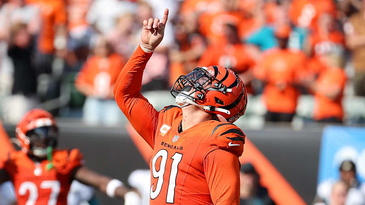 Sep 14, 2025; Cincinnati, Ohio, USA;  Cincinnati Bengals defensive end Trey Hendrickson (91) celebrates his sack during the fourth quarter against the Jacksonville Jaguars at Paycor Stadium. Mandatory Credit: Joseph Maiorana-Imagn Images