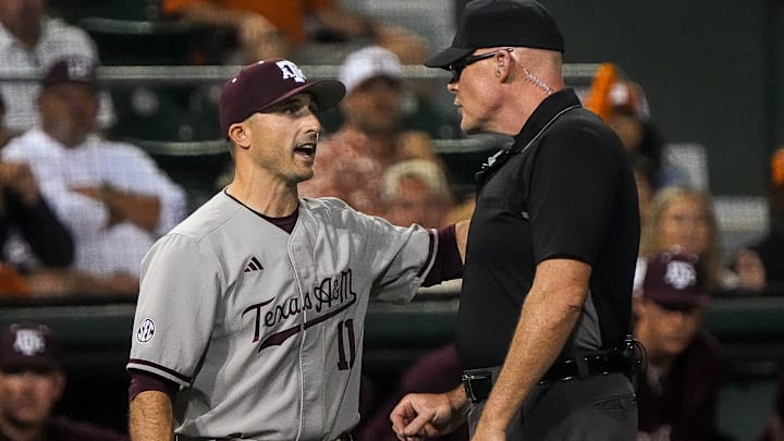 Texas A&M head coach Michael Earley talks to an official during the Lone Star Showdown against Texas at UFCU Disch-Falk Field on Friday, April 25, 2025.