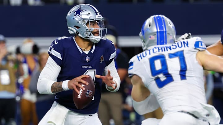 Dec 30, 2023; Arlington, Texas, USA; Dallas Cowboys quarterback Dak Prescott (4) throws as Detroit Lions defensive end Aidan Hutchinson (97) rushes during the second half at AT&T Stadium. Mandatory Credit: Kevin Jairaj-Imagn Images