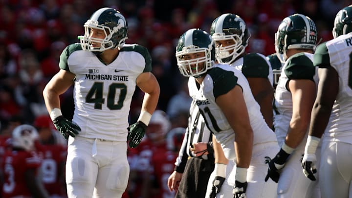 Oct 27, 2012; Madison, WI, USA; Michigan State Spartans linebacker Max Bullough (40) waits for directions as his team plays the Wisconsin Badgers at Camp Randall Stadium. Mandatory Credit: Mary Langenfeld-Imagn Images Oct 27, 2012; Madison, WI, USA; Michigan State Spartans linebacker Max Bullough (40) waits for directions as his team plays the Wisconsin Badgers at Camp Randall Stadium. Mandatory Credit: Mary Langenfeld-Imagn Images