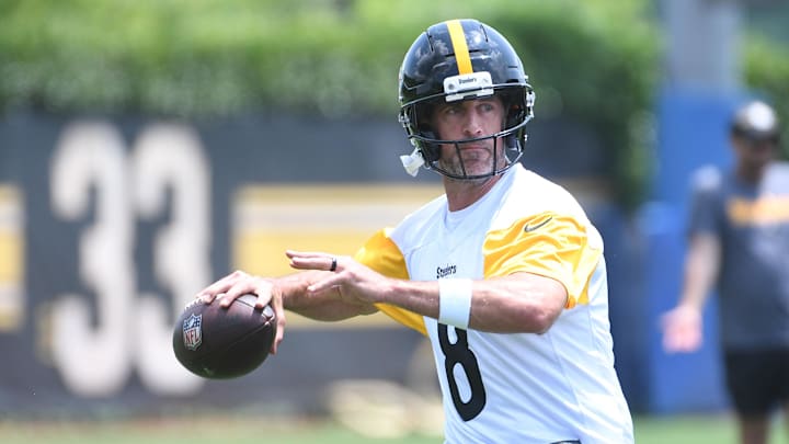 Pittsburgh Steelers quarterback Aaron Rogers (8) drops back to pass during minicamp at their South Side facility. Pittsburgh Steelers quarterback Aaron Rogers (8) drops back to pass during minicamp at their South Side facility.