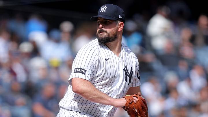 New York Yankees starting pitcher Carlos Rodon (55) pitches against the Tampa Bay Rays during the second inning at Yankee Stadium. New York Yankees starting pitcher Carlos Rodon (55) pitches against the Tampa Bay Rays during the second inning at Yankee Stadium.