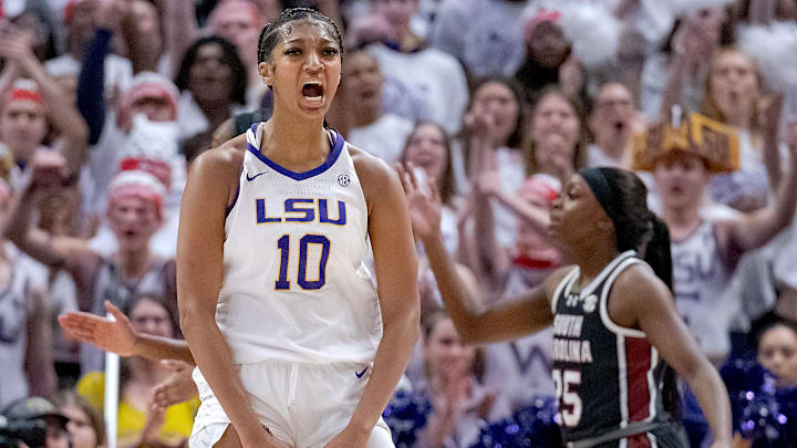 Jan 25, 2024; Baton Rouge, Louisiana, USA; LSU Lady Tigers forward Angel Reese (10) reacts after a score against the South Carolina Gamecocks during the first half at Pete Maravich Assembly Center. Mandatory Credit: Matthew Hinton-Imagn Images