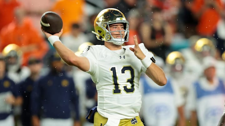 Notre Dame Fighting Irish quarterback CJ Carr threw a no-look touchdown for his first TD pass vs. Miami.