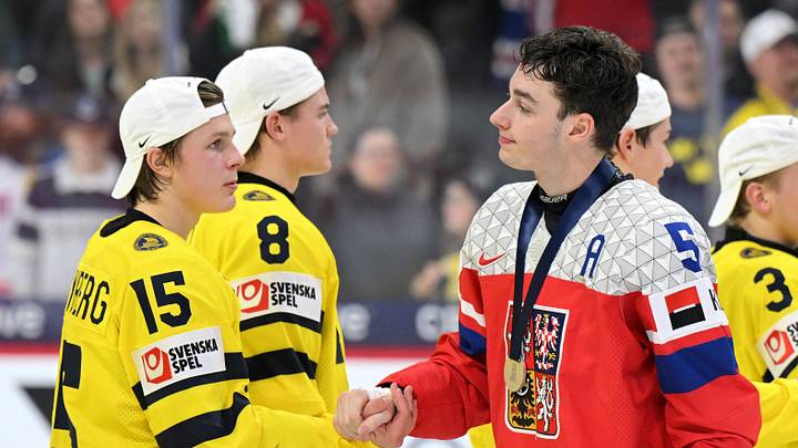 Jan 5, 2026; St. Paul, Minnesota, USA; Sweden forward Ivar Stenberg (15) and Czechia defensemen Adam Jiricek (5) shake hands after the final of the 2026 IIHF World Junior Championship ice hockey tournament at Grand Casino Arena. Mandatory Credit: Nick Wosika-Imagn Images