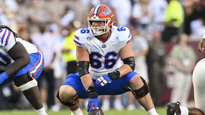 Oct 11, 2025; College Station, Texas, USA; Florida Gators offensive lineman Jake Slaughter (66) sets the ball during the first half against the Texas A&M Aggies at Kyle Field. Mandatory Credit: Maria Lysaker-Imagn Images 