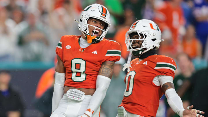 Sep 20, 2025; Miami Gardens, Florida, USA; Miami Hurricanes defensive back Jakobe Thomas (8) defensive back Keionte Scott (0) after sacking Florida Gators quarterback DJ Lagway (not pictured) during the second quarter at Hard Rock Stadium. Mandatory Credit: Sam Navarro-Imagn Images Sep 20, 2025; Miami Gardens, Florida, USA; Miami Hurricanes defensive back Jakobe Thomas (8) defensive back Keionte Scott (0) after sacking Florida Gators quarterback DJ Lagway (not pictured) during the second quarter at Hard Rock Stadium. Mandatory Credit: Sam Navarro-Imagn Images