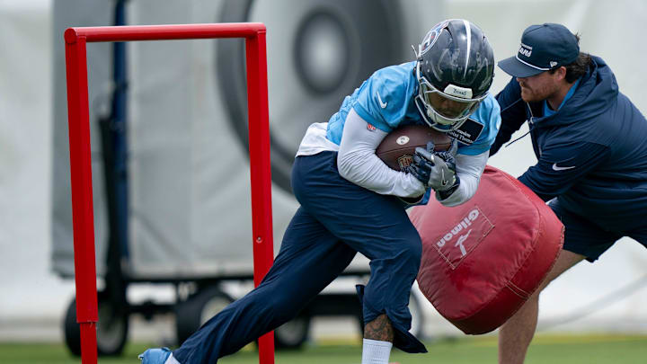 Tennessee Titans running back Tony Pollard (20) runs drills during OTAs at Ascension Saint Thomas Sports Park in Nashville, Tenn., Wednesday, May 28, 2025.