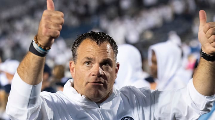 Penn State Athletic Director Pat Kraft gives two thumbs up to the Beaver Stadium student section at a Nittany Lions football game. 