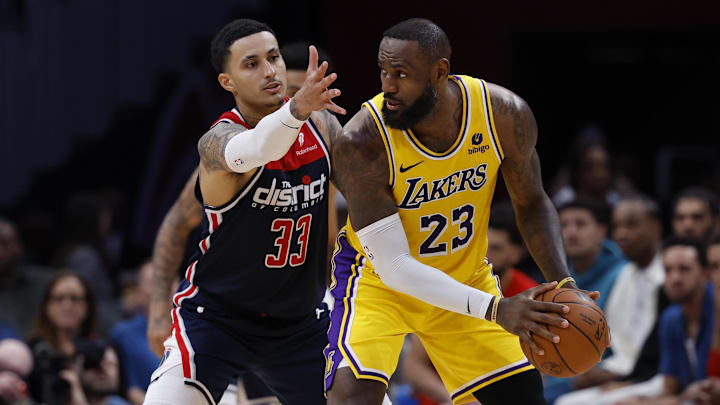 Apr 3, 2024; Washington, District of Columbia, USA; Los Angeles Lakers forward LeBron James (23) and Washington Wizards forward Kyle Kuzma (33). Apr 3, 2024; Washington, District of Columbia, USA; Los Angeles Lakers forward LeBron James (23) and Washington Wizards forward Kyle Kuzma (33).