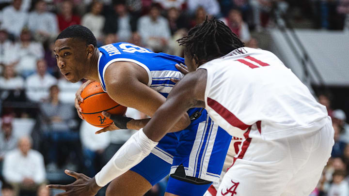 Feb 22, 2025; Tuscaloosa, Alabama, USA; Kentucky Wildcats forward Brandon Garrison (10) works against Alabama Crimson Tide center Clifford Omoruyi (11) during the second half at Coleman Coliseum. Mandatory Credit: Will McLelland-Imagn Images