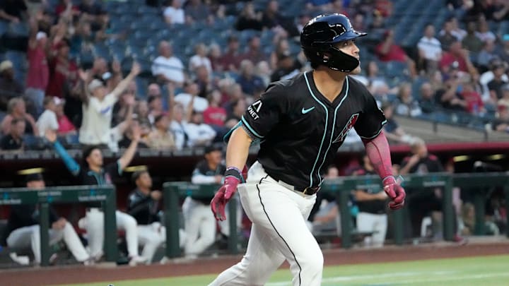 Arizona Diamondbacks’ Corbin Carroll (7) drops his bat after connecting for a solo home run against the Tampa Bay Rays during the first inning at Chase Field on April 23, 2025, in Phoenix.