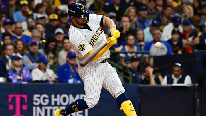Oct 3, 2024; Milwaukee, Wisconsin, USA; Milwaukee Brewers catcher Gary Sanchez (99) hits a double in the second inning against the New York Mets during game three of the Wildcard round for the 2024 MLB Playoffs at American Family Field. 