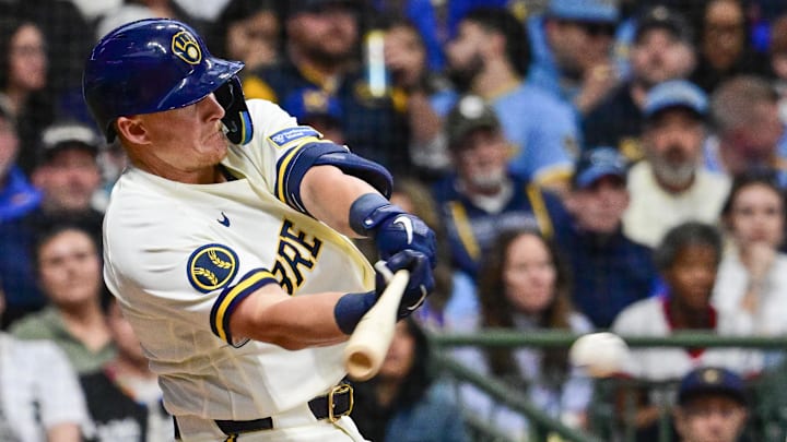Mar 26, 2026; Milwaukee, Wisconsin, USA;  Milwaukee Brewers first baseman Andrew Vaughn (28) drives in a run with a base hit in the sixth inning against the Chicago White Sox at American Family Field. Mandatory Credit: Benny Sieu-Imagn Images
