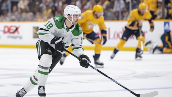Feb 15, 2024; Nashville, Tennessee, USA; Dallas Stars center Sam Steel (18) skates with the puck against the Nashville Predators during the second period at Bridgestone Arena. Mandatory Credit: Steve Roberts-Imagn Images