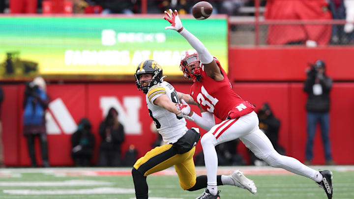 Nov 24, 2023; Lincoln, Nebraska, USA; Nebraska Cornhuskers defensive back Tommi Hill (31) blocks a pass intended for Iowa Hawkeyes wide receiver Nico Ragaini (89) at Memorial Stadium. Nov 24, 2023; Lincoln, Nebraska, USA; Nebraska Cornhuskers defensive back Tommi Hill (31) blocks a pass intended for Iowa Hawkeyes wide receiver Nico Ragaini (89) at Memorial Stadium.