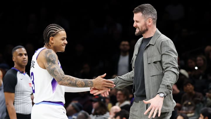 Dec 4, 2025; Brooklyn, New York, USA; Utah Jazz guard Keyonte George (3) reacts with forward Kevin Love (42) after a timeout against Brooklyn Nets during the fourth quarter at Barclays Center. Mandatory Credit: Tom Horak-Imagn Images