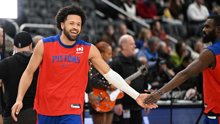 Jan 1, 2025; Detroit, Michigan, USA;  Detroit Pistons guard Cade Cunningham (2) greets teammate Tim Hardaway Jr. (8) during pregame warmups before their game against the Orlando Magic at Little Caesars Arena. Mandatory Credit: Lon Horwedel-Imagn Images
