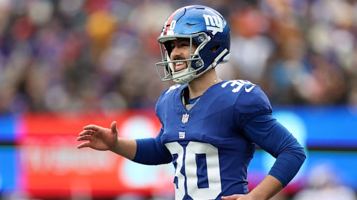 Dec 21, 2025; East Rutherford, New Jersey, USA; New York Giants kicker Ben Sauls (30) reacts against the Minnesota Vikings during the first half at MetLife Stadium.  