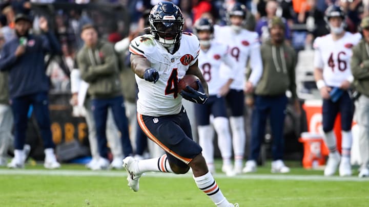 Oct 26, 2025; Baltimore, Maryland, USA;  Chicago Bears running back D'Andre Swift (4) rushes during the fourth quarter against the Baltimore Ravens at M&T Bank Stadium. 