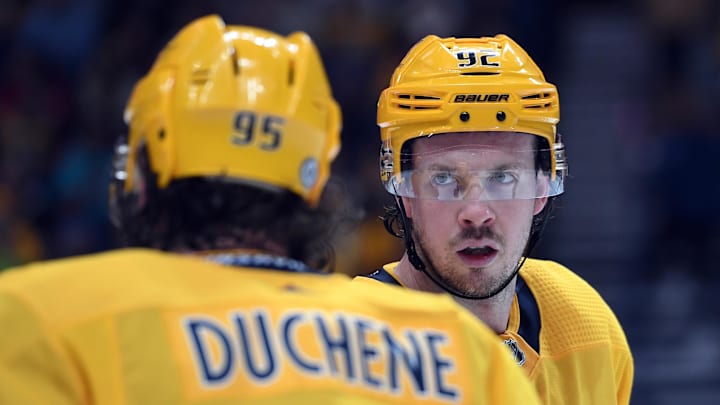 Feb 21, 2023; Nashville, Tennessee, USA; Nashville Predators center Ryan Johansen (92) talks with center Matt Duchene (95) during the first period at Bridgestone Arena. Mandatory Credit: Christopher Hanewinckel-Imagn Images