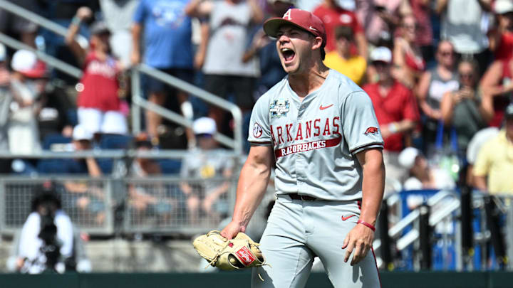 Jun 16, 2025; Omaha, Neb, USA; Arkansas Razorbacks starting pitcher Gage Wood (14) celebrates completing a no hitter against the Murray State Racers at Charles Schwab Field. Mandatory Credit: Steven Branscombe-Imagn Images