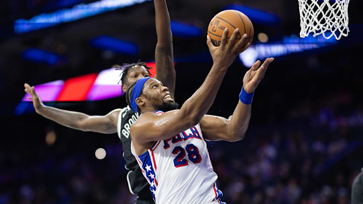 Oct 16, 2024; Philadelphia, Pennsylvania, USA; Philadelphia 76ers forward Guerschon Yabusele (28) drives for a shot against the Brooklyn Nets during the third quarter at Wells Fargo Center. Mandatory Credit: Bill Streicher-Imagn Images