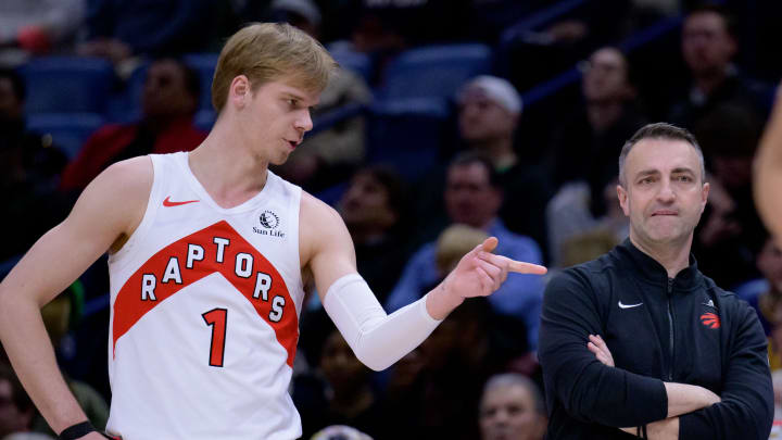 Feb 5, 2024; New Orleans, Louisiana, USA; Toronto Raptors guard Gradey Dick (1) talks with Toronto Raptors head coach Darko Rajakovic against the New Orleans Pelicans during the first half at Smoothie King Center. Mandatory Credit: Matthew Hinton-USA TODAY Sports