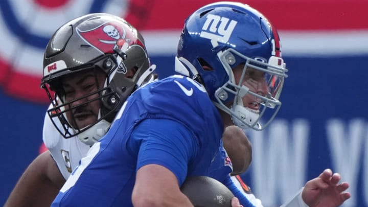 East Rutherford, NJ -- November 24, 2024 -- Calijah Kancey of Tampa Bay sacks Tommy DeVito of the Giants in the first half as the Tampa Bay Buccaneers came to MetLife Stadium and defeated the New York Giants 30-7.
