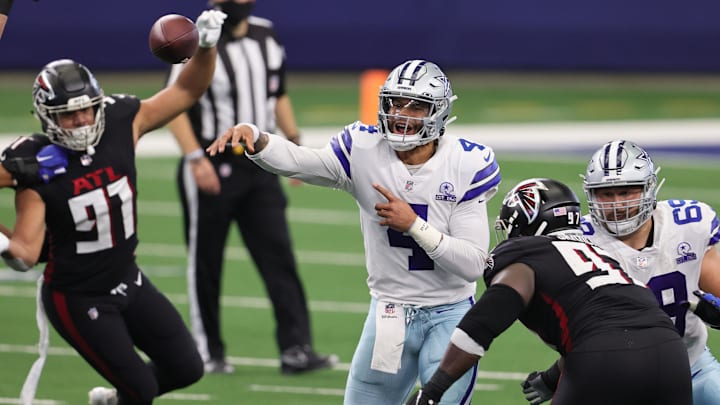 Sep 20, 2020; Arlington, Texas, USA;  Dallas Cowboys quarterback Dak Prescott (4) throws in the pocket in the second quarter against the Atlanta Falcons at AT&T Stadium. Mandatory Credit: Matthew Emmons-Imagn Images