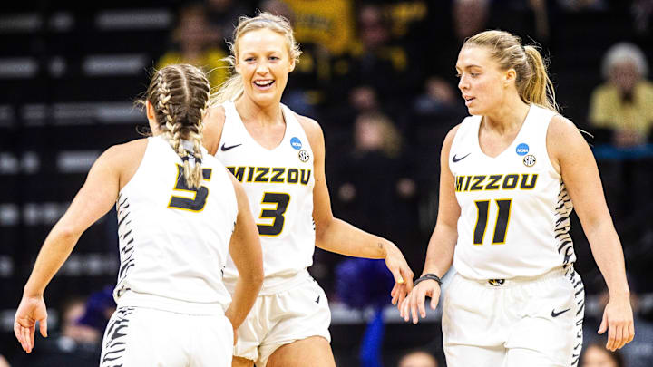 Missouri guard Sophie Cunningham (3) celebrates with teammates Lauren Aldridge, left, and Haley Troup (11) during a NCAA women's basketball tournament first-round game, Friday, March 22, 2019, at Carver-Hawkeye Arena in Iowa City, Iowa.

Syndication Desmoines