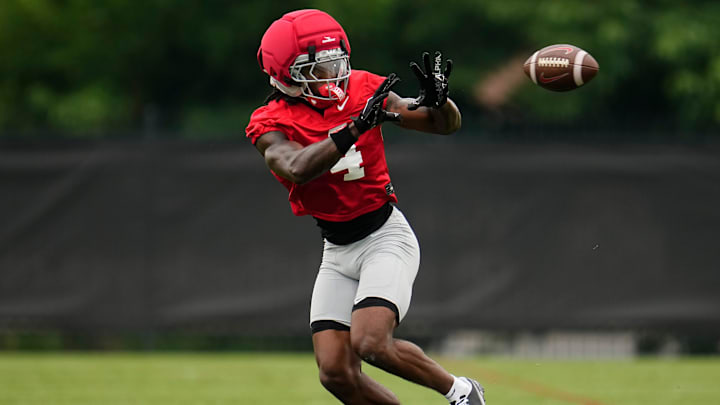 Ohio State Buckeyes wide receiver Jeremiah Smith (4) catches a pass during the first football practice of the season at the Woody Hayes Athletic Center on July 31, 2025.